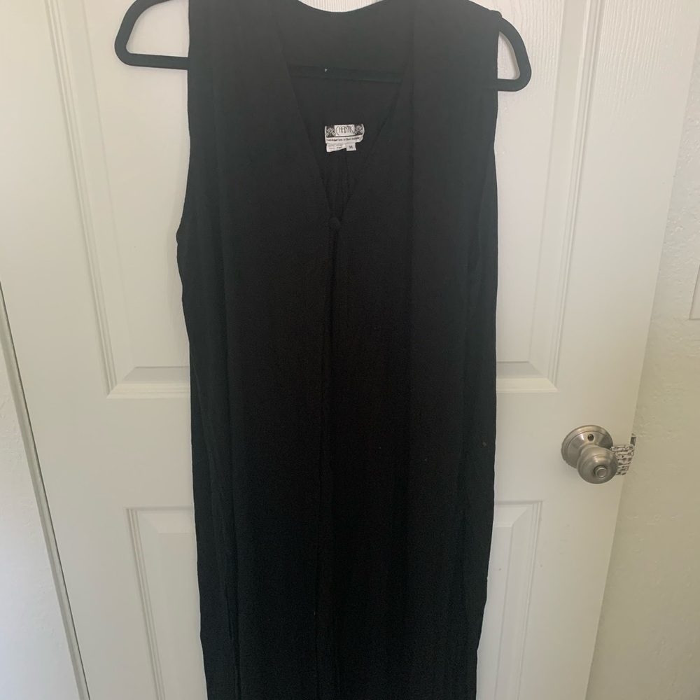 Black vest with one button closer size medium